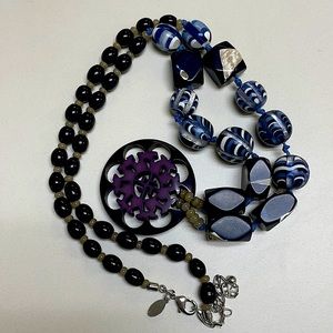 Chico’s long beaded necklace in blue and deep purple.